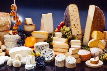 Assortment of cheese and fruit.