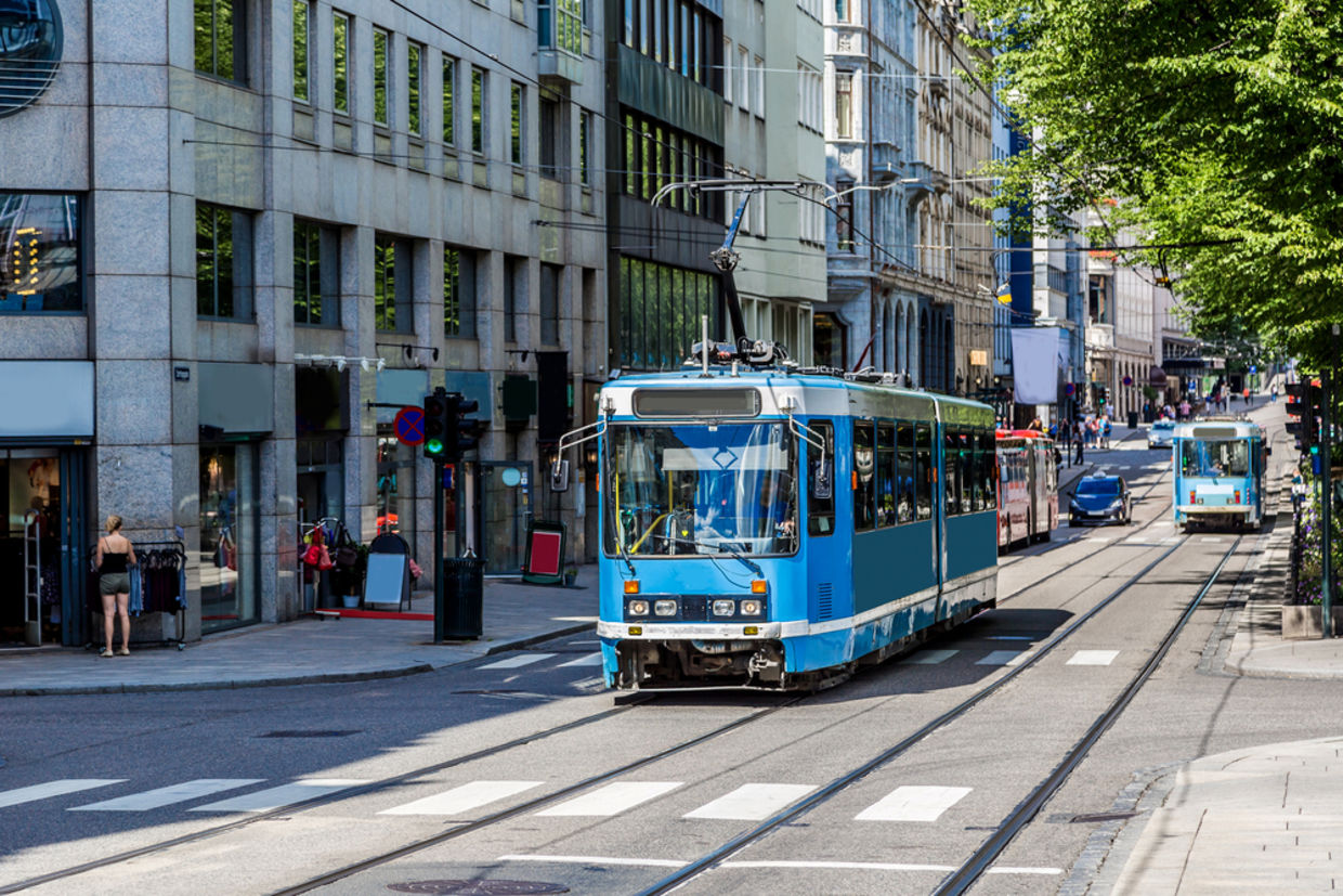 Modern blue tram in Oslo in Norway in a summer day