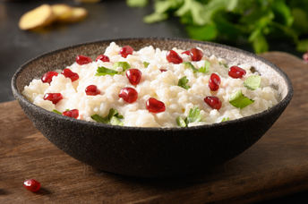 Curd Rice with pomegranate is a healthy Indian dish.