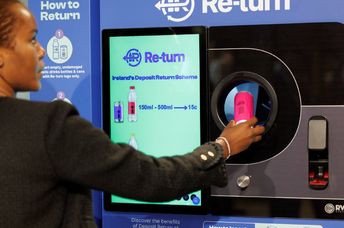 Returning cans and bottles for recycling is easy with this vending machine.