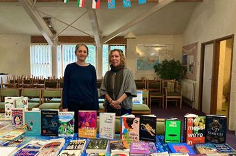 Bookbank volunteers staff the stall in Norwich.