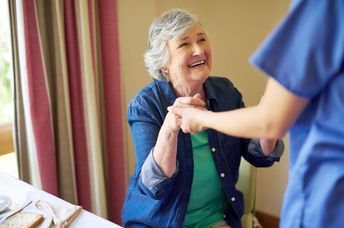 Helping a stroke patient regain lost movement.