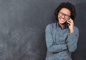 Happy man talking on the phone