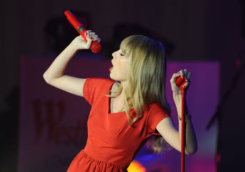 Taylor Swift performs at Westfield Shepherd's Bush, London.