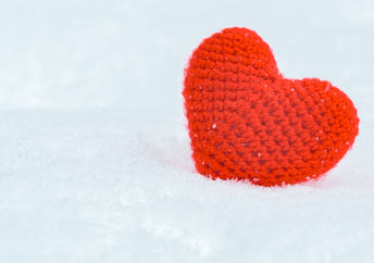 Crochet heart in snow