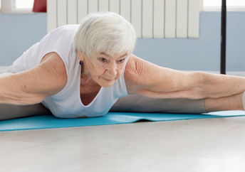 Elderly yoga instructor.