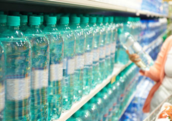 Person shopping for water.