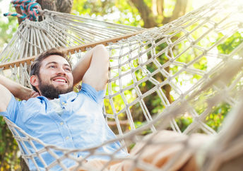 Relaxing in a hammock after a long day.