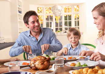 Family around the dinner table.