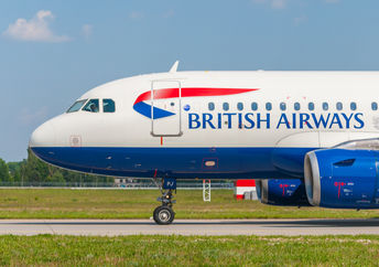 An airplane on the ground ready to roll.