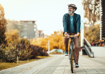 a man on a bicycle.