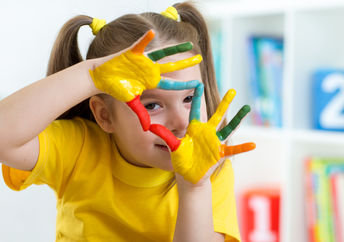 child fingerpainting.