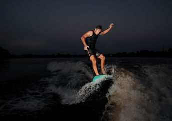 Surfing on a wakeboard.