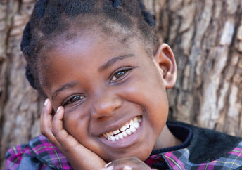 A smiling girl.