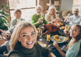 Family enjoying a traditional Thanksgiving feast.