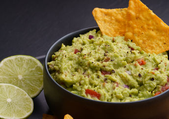 Guacamole with tortilla chips.