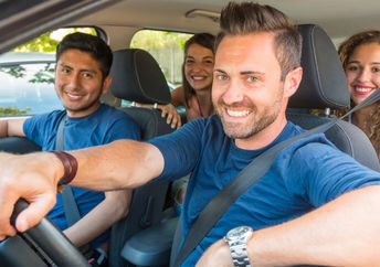 People sharing a car ride.