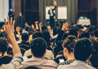 A lecture in a conference hall.