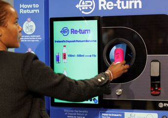 Returning cans and bottles for recycling is easy with this vending machine.