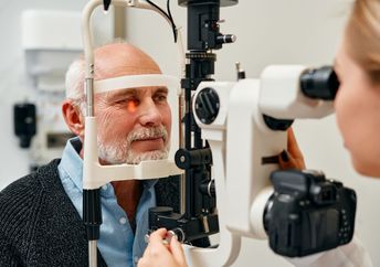 A senior getting an eye exam.