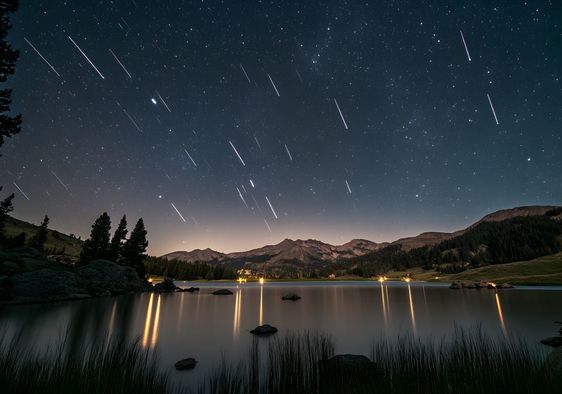 Meteor shower in the night sky.