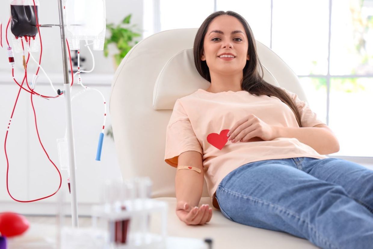 Woman donating blood.