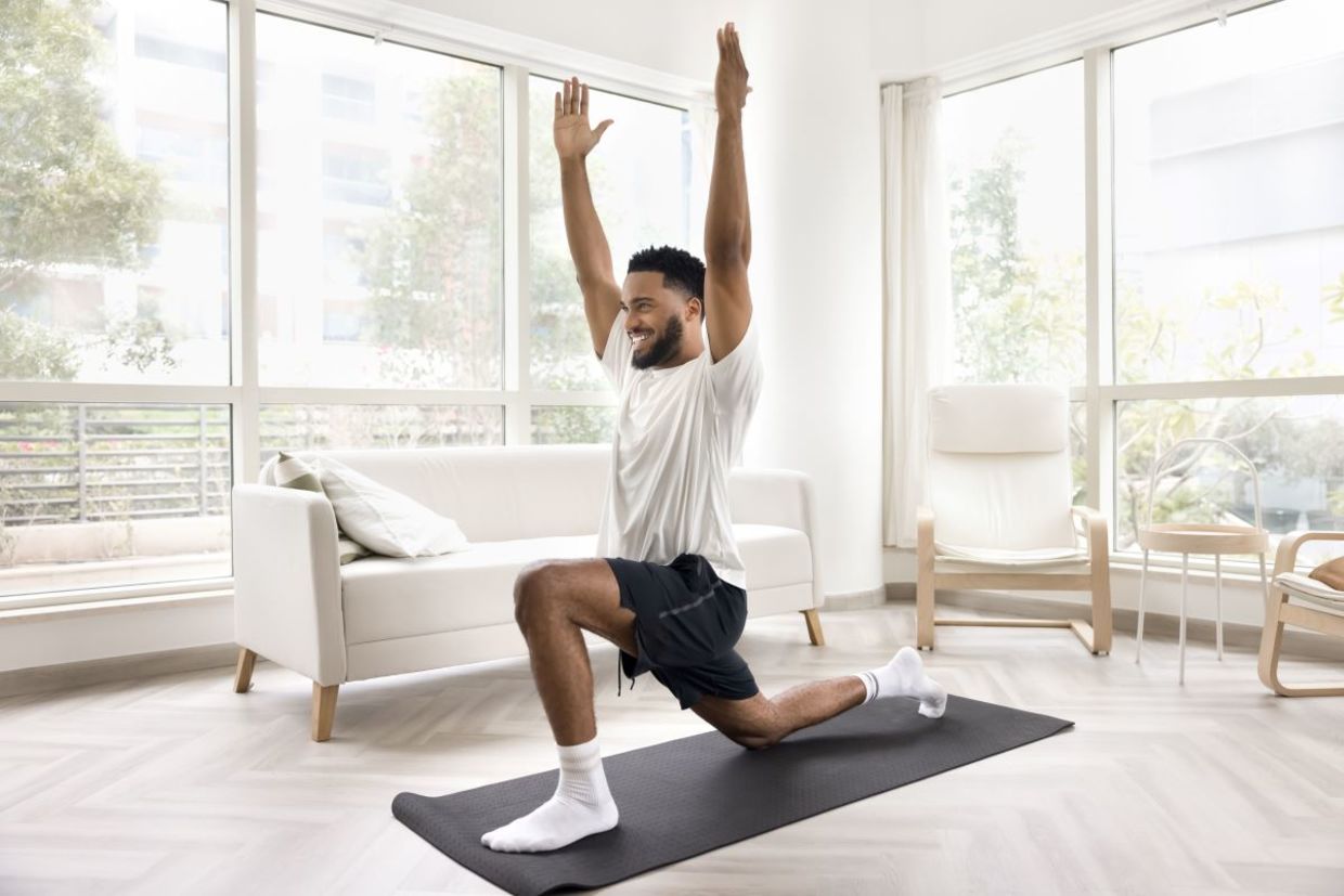 Stretch with the low lunge yoga pose.