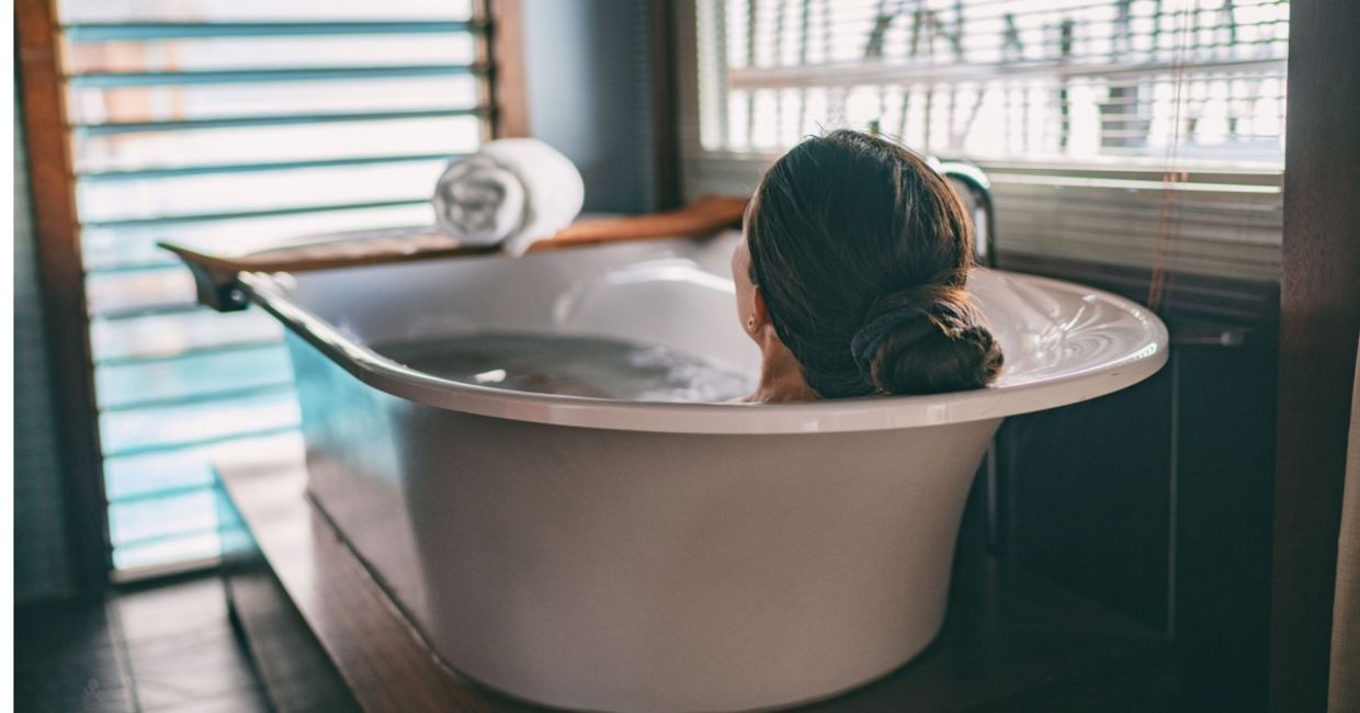 Taking a healing oatmeal bath.