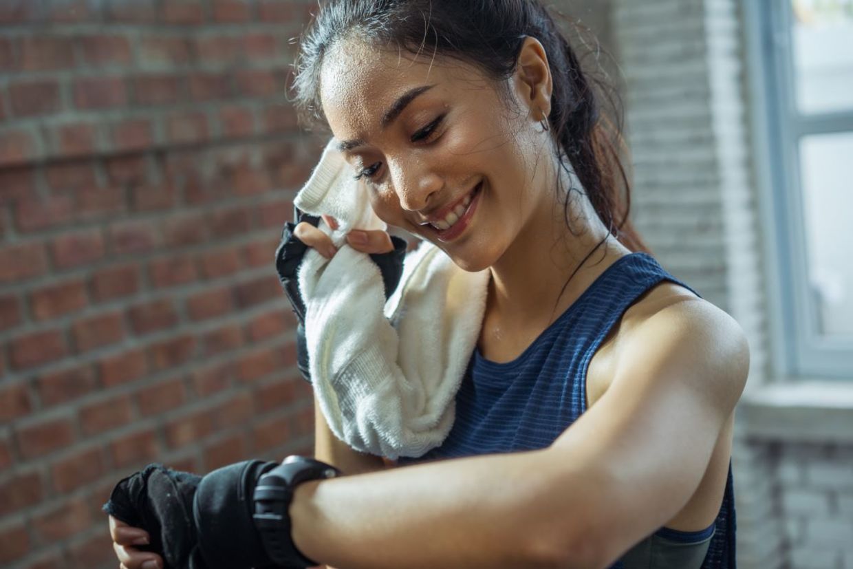 Woman athlete working up a sweat.