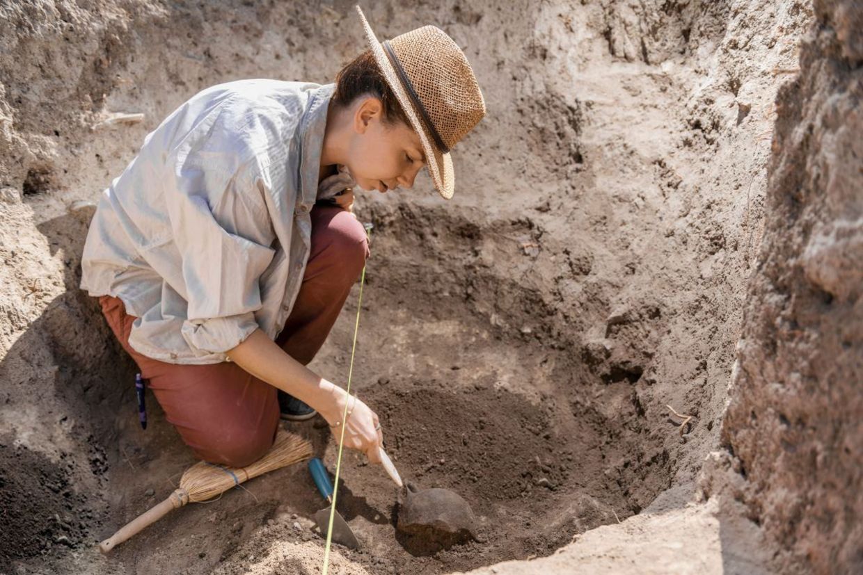 Archaeological dig volunteer.