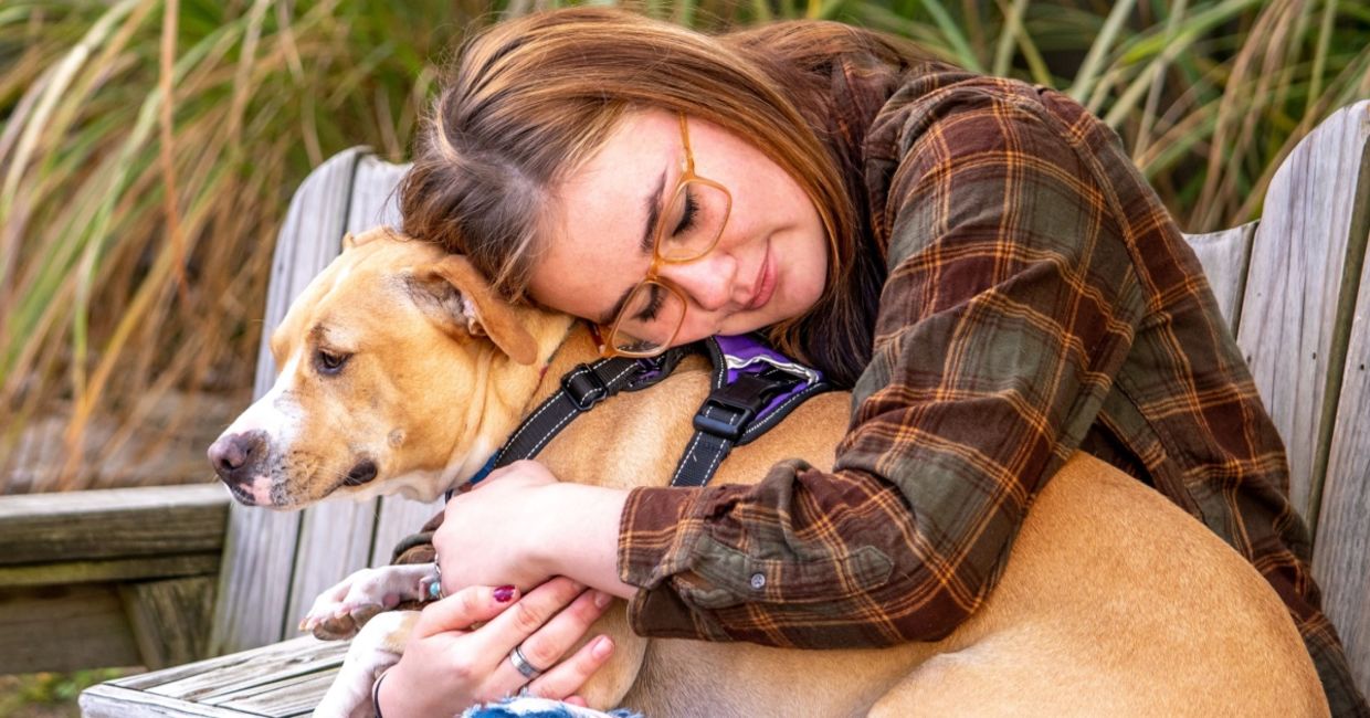 A woman with her therapy dog.