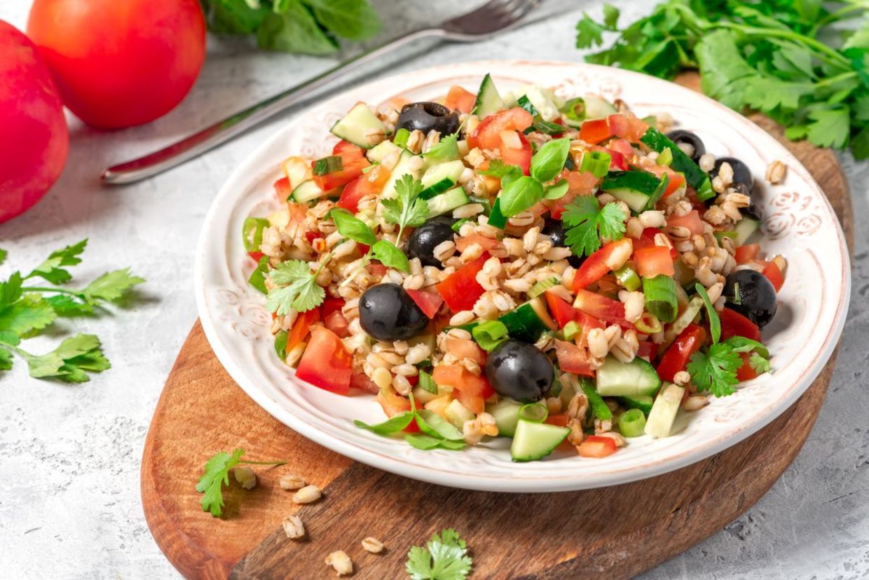 Pearl barley salad with olives.