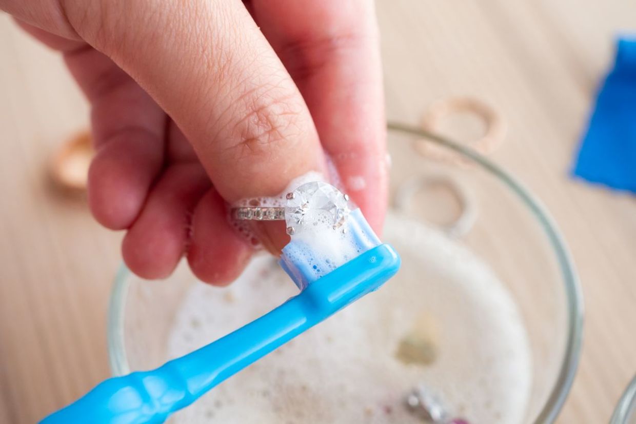 Cleaning jewelry with toothpaste,