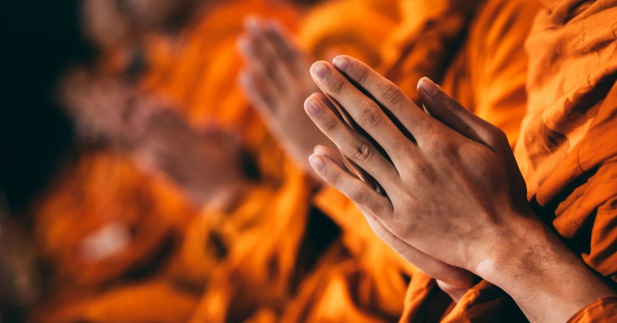 Buddhist monks chanting.