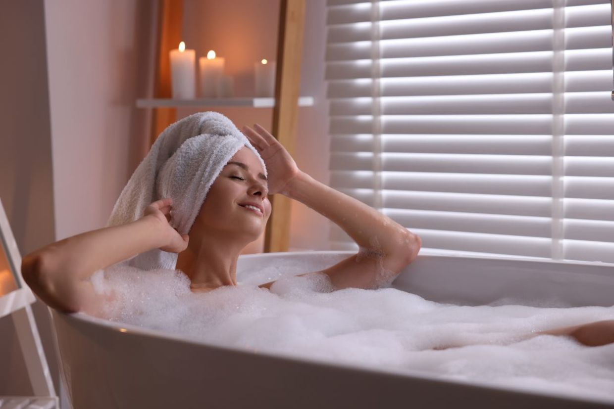 Soaking in a bathtub.