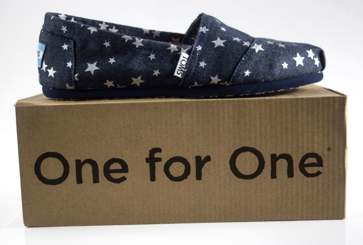 TOMS shoes buy one, give one,