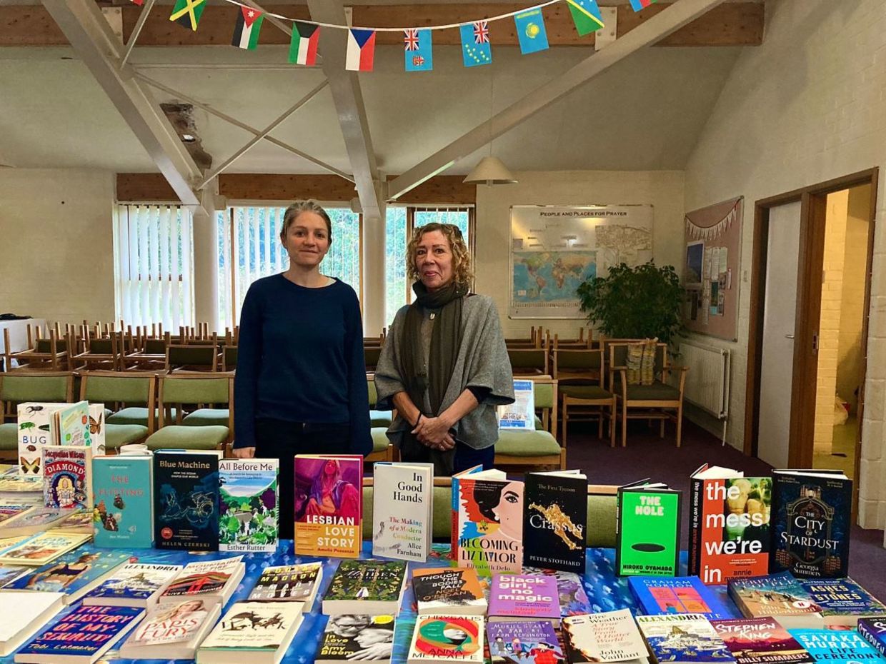 Bookbank volunteers staff the stall in Norwich.