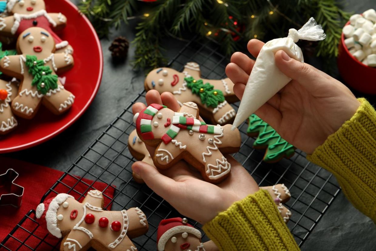 Decorating gingerbread men.