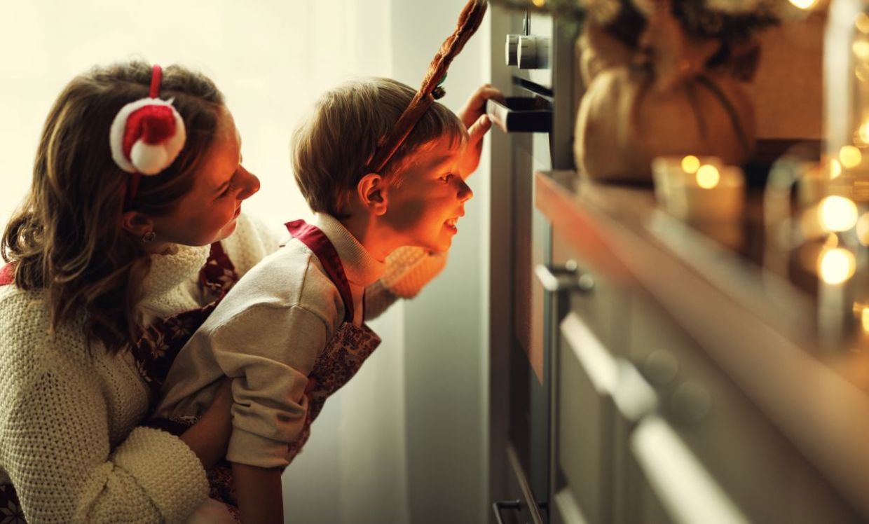 Mother and son cooking a festive meal.