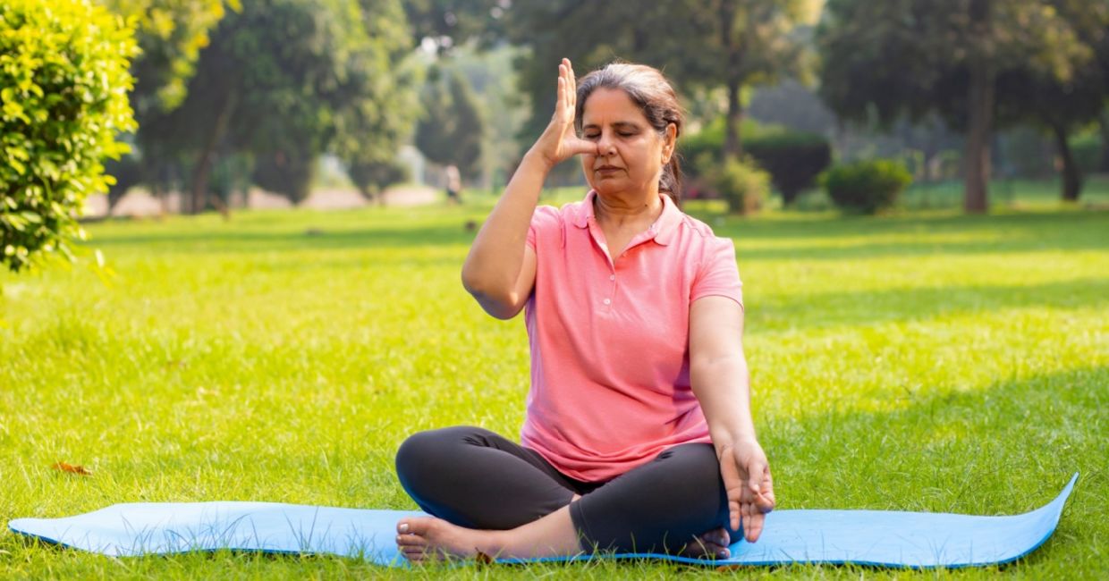 Woman practicing breathing exercises.