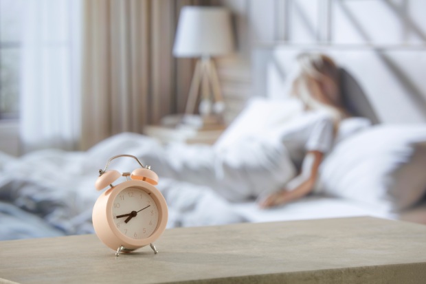 An alarm clock on a table.